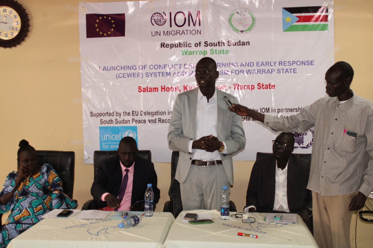 Minister of Cabinet Affairs Warrap State giving a speech on behalf of the Governor during the closing ceremony of the STT training
